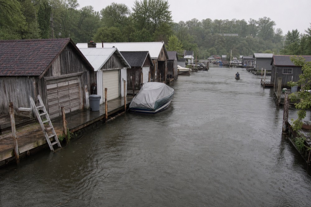 Wooden fishing shanties and docks along the Leland River channel