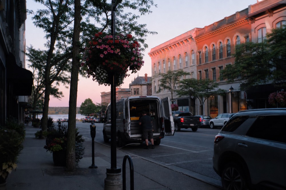 Downtown Traverse City storefronts along Front Street in evening light